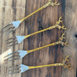 Load image into Gallery viewer, Stainless Steel and brass forks, set of 4 with reindeer tops
