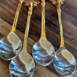 Load image into Gallery viewer, Stainless Steel and brass spoons, set of 4 with reindeer tops
